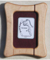 Rectangular frame with rectangle opening Hard Maple Beautifully handcrafted wooden frame 4" long x 5" high x 3/4" wide Sawtooth on the back for hanging Two drilled hanger holes in the back of the frame for hanging Four movable tabs allow access to change out photographs