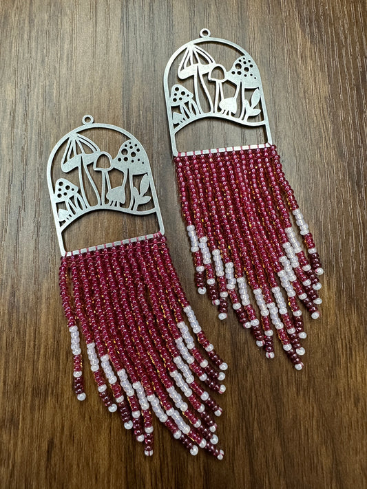 Fly Amanita Mushroom Beaded Earrings  These hand beaded fringe earrings are an enchanting addition to your jewelry box  Beautifully crafted and individually strung  These earrings use the very best quality Japanese seed beads and stainless steel findings  Fitted with stainless steel french ear wires  These pieces are more suitable for most sensitive ears.