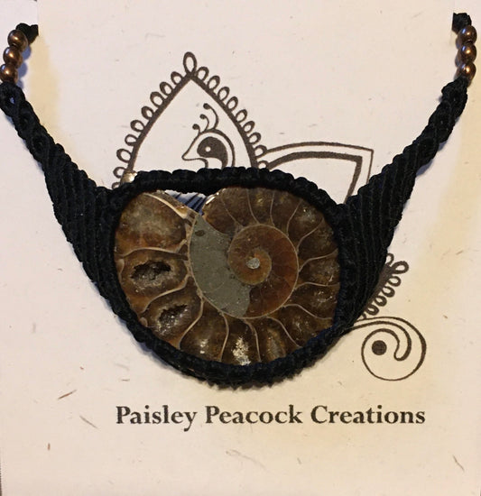 Hand knotted macrame necklace with ammonite   