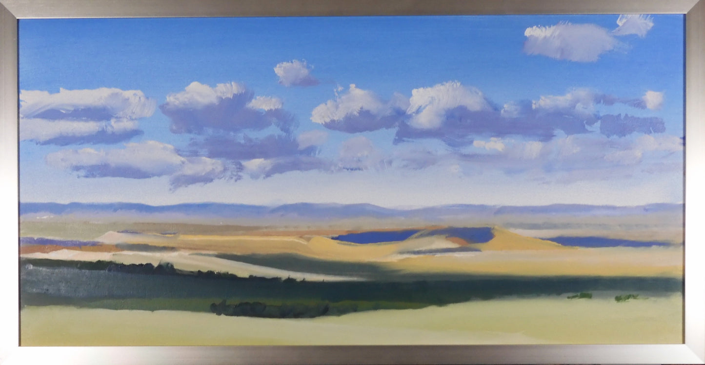 "Forever Afternoon " Framed Original Oil Painting Artist: Jon Madsen Original Oil painting Clouds over a beautiful late summer prairie Mountains in distance Lake in the mid ground 30" long x 12 " high original oil 31" long x 13 " high framed Silver frame D-ring and wire on the back for hanging Please note item is an original from the artist