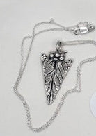 Necklace - Milkweed Texture on Arrowhead Pendant
