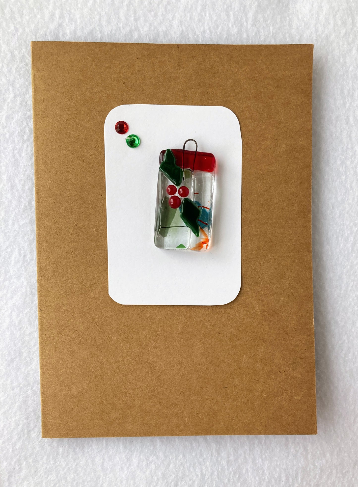 Fused Glass Christmas Ornament Rectangular Ornament with holy leaf and red and white background 1' wide 0.5' long 0.25 high ornament