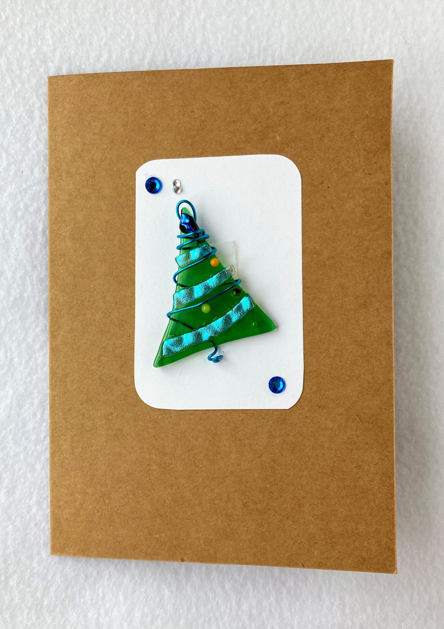 Fused Glass Ornament and card Light green Christmas Tree with iridescent blue stripes Blue wire wrapping gives the looks of festive tinsel 1" long x 3 1/2" high tree Ornament