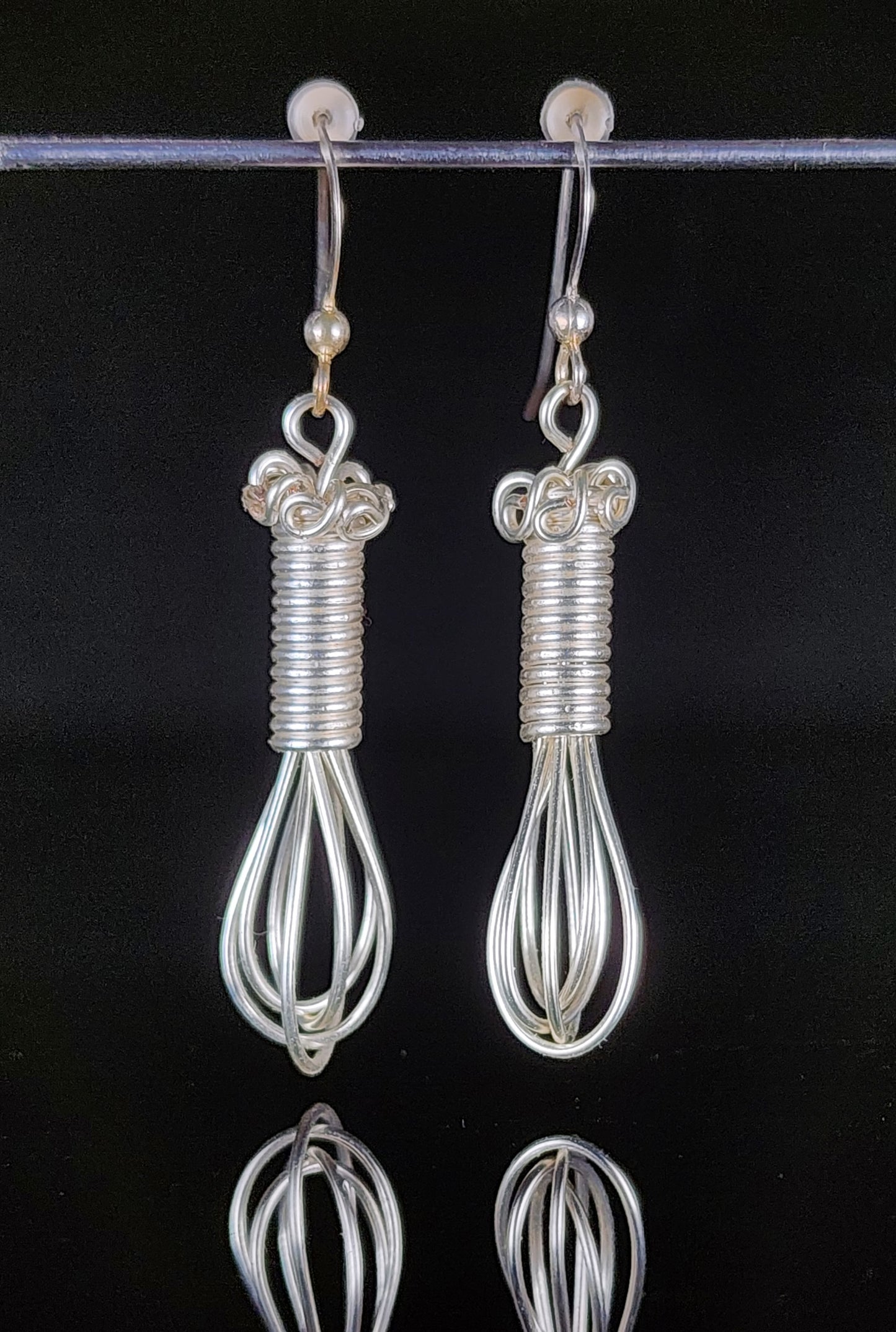 Silver colored artistic wire in the shape of a whisk Stirling silver ear wires 1.6" long x .93" wide Perfect for anyone who enjoys cooking