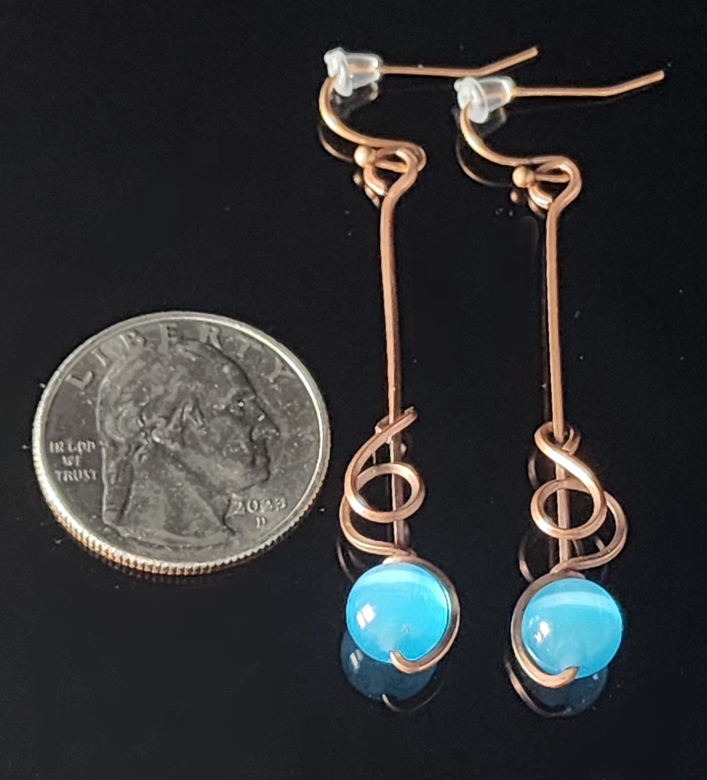 Brilliant Blue cat's eye sphere wrapped in copper wire 2" long x 1/4" wide Copper wires earring hooks Beautiful dangle earrings