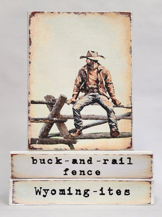 Print of a cowboy sitting on a fence