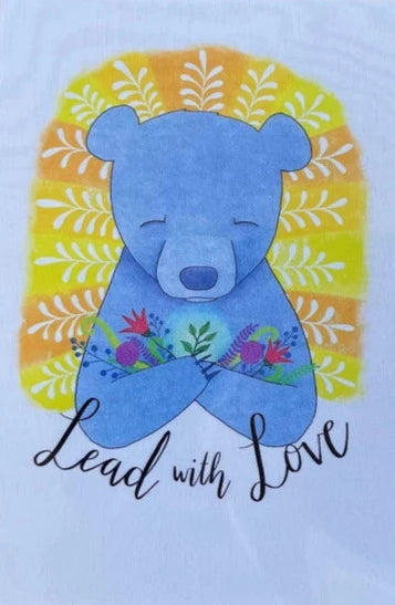 " Lead with Love "Bear with Flowers Print Artist: Tara Pappas 5" x 7" Print Blue Bear Armful of flowers Yellow and orange background Ready for a mat and frame Comes with a protective foam backing Protected in a clear sleev