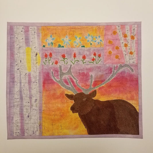 Fiber Art Wall Hanging " Elk " Artist: Crystal Lawrence Hand dyed and hand stitched fabric art piece  Wyoming wildflowers and Aspen trees come to life  Bull Elk standing in the sunset  25" long x 21" high  Wooden dowel with fabric slots on back of piece for hanging  A beautiful one of a kind piece of art that will become a family heirloom  Please note, each piece is a handmade and custom designed by the Artist   Location: CLL