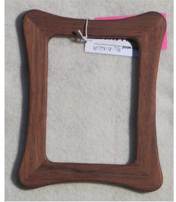 Magnetic Rectangular frame with rectangle opening  Bubinga Wood  Beautifully handcrafted wooden frame with magnet  4" long x 5" high x 3/10" wide  Magnet inside the frame allows frame to hang on any metal surface
