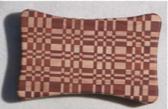 Self healing wooden cheese board in geometric pattern  Cherry and Hard Maple wood  Beautifully handcrafted wooden cheese board  Bathed in mineral oil and finished with Beeswax  Four rubber feet to help protect countertop  Food Safe  4" long x 6" wide x 3/4" high