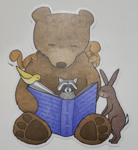 Bear Reading Sticker Artist:  Tara Pappas  Brown bear is reading to his animal friends  Two squirrels sit on the bears shoulder  Rabbit is standing by the bears left foot  Yellow bird is holding the pages of the book on the Bear's right side.  Racoon is in the middle of the Bear's lap  Blue book says " three good fish "  Sticker is a cut out  3 5/8" high x 3 1/2" Wide x 1/16" Deep  Would look great on a water bottle or laptop 