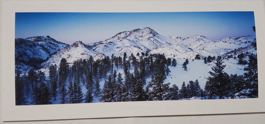 " Wyoming Notch Peak 7915, Officially know as Collins Peak " Panoramic Card Photographer: Susan Davis  Photograph taken in winter of Collins Peak  Collins peak has an elevation of 7,779  feet is seen in the center of the photograph  Printed with pigment ink on smooth matte paper  9" long x 4" high blank card with envelope  Friends and family will love receiving a note with this card  Beautiful enough to
