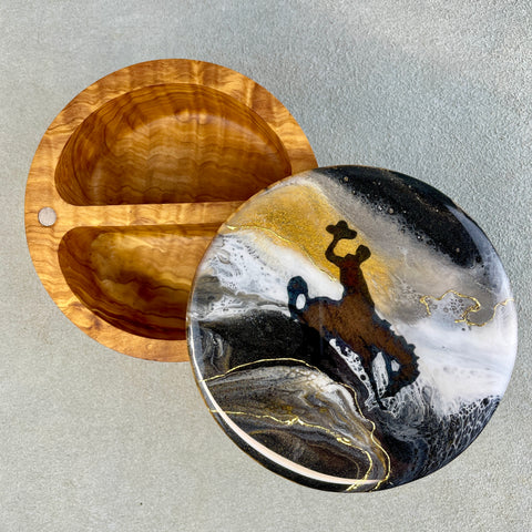 Bronc and rider decal on an olive wood salt cellar. Black, white and gold resin with 24K gold accent