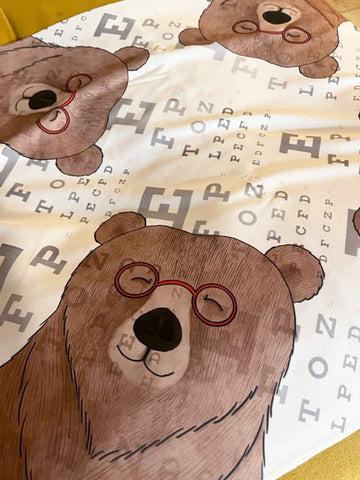 "Bear Visions " Bandana Artist:  Tara Pappas  This 22"x22" soft cloth can be used in a variety of ways to add extra joy and whimsy to your tables, furniture, fashion, and more! 