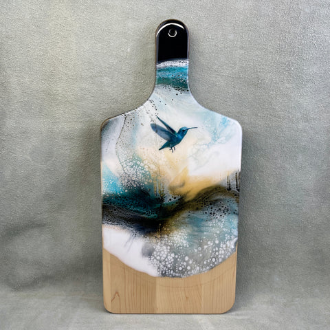 maple cutting board. Blue hummingbird decal with teal, while and black resin