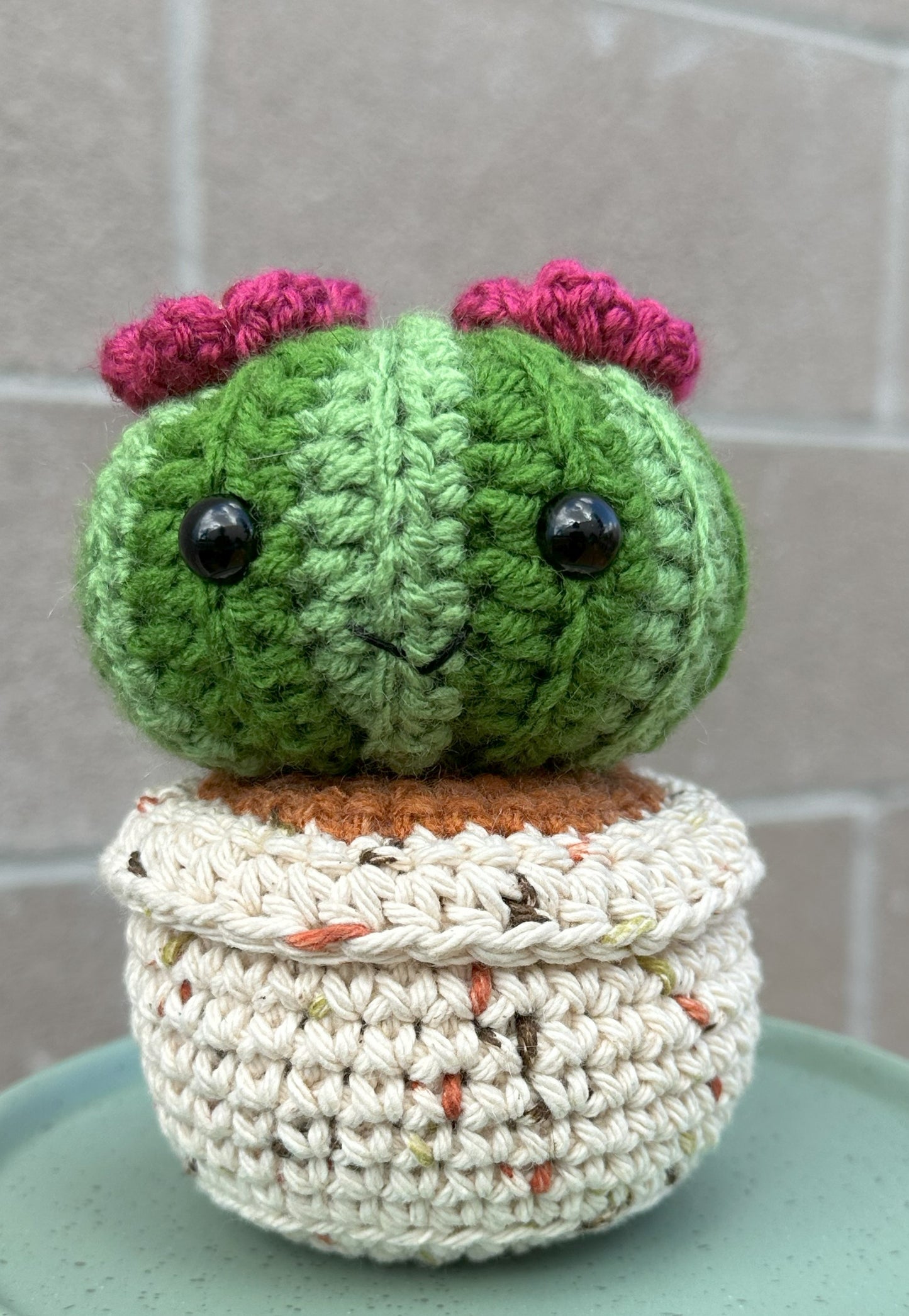 Hand Crochet Grassy Green Budding Barrel Cactus with Orchid Flower in Sandy Pot