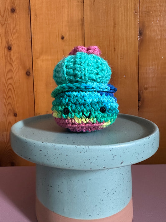 Mint Mini Baby Barrel with a Pink Flower in a Tie-Dye Pot