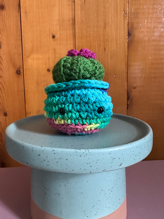 Mossy Mini Baby Barrel with Orchid Flower in a Tie-Dye Pot