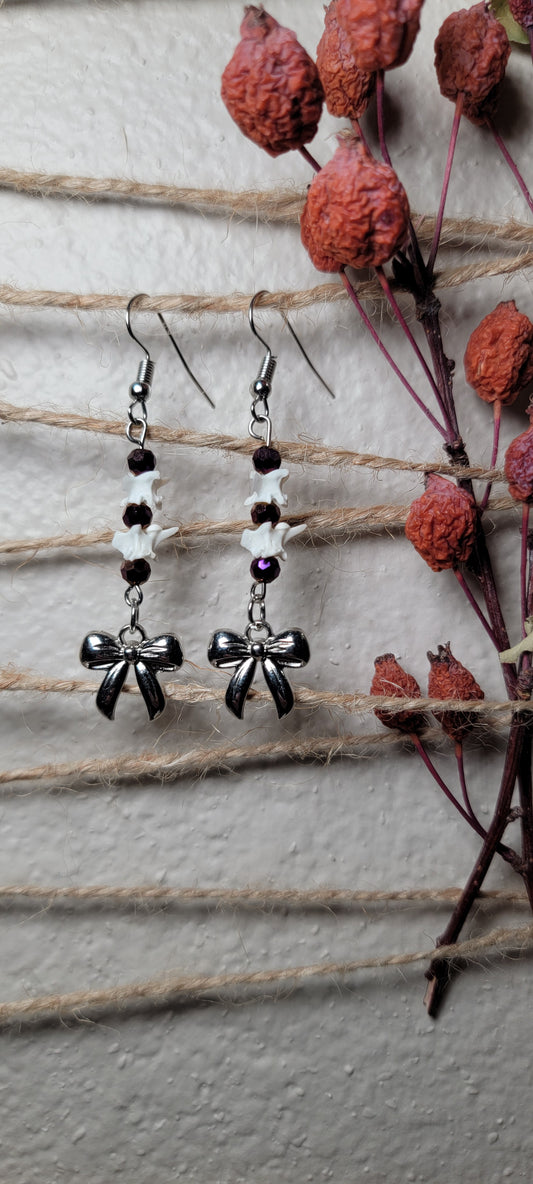Earrings - Rattlesnake Vertebrae with Purple Beads and Bow Charm