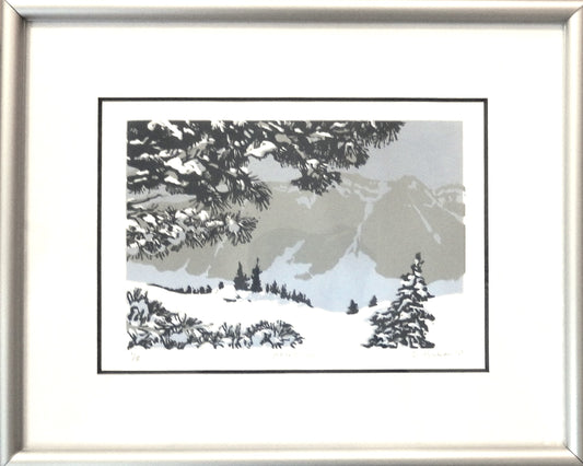 block print resembling a snowy scene on the Snowy Range Mountains with pine trees