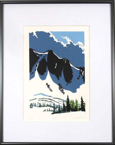 block print of a mountain face with dark clouds behing and trees in front