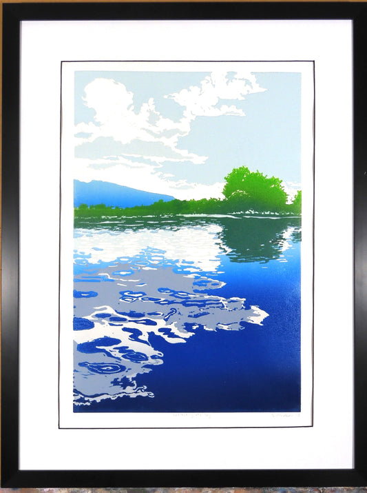 refection of the clouds in the calm waters of a river. block print
