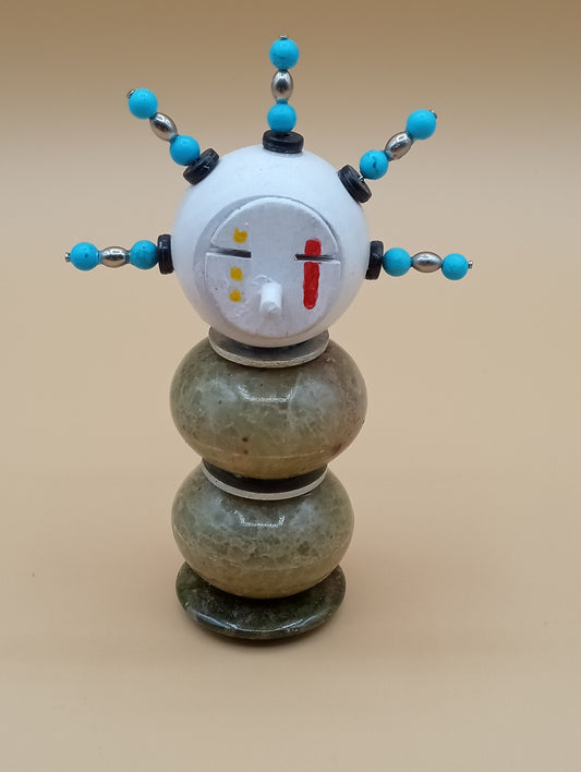 Small stone figure Yellow and red face Silver and turquoise hair
