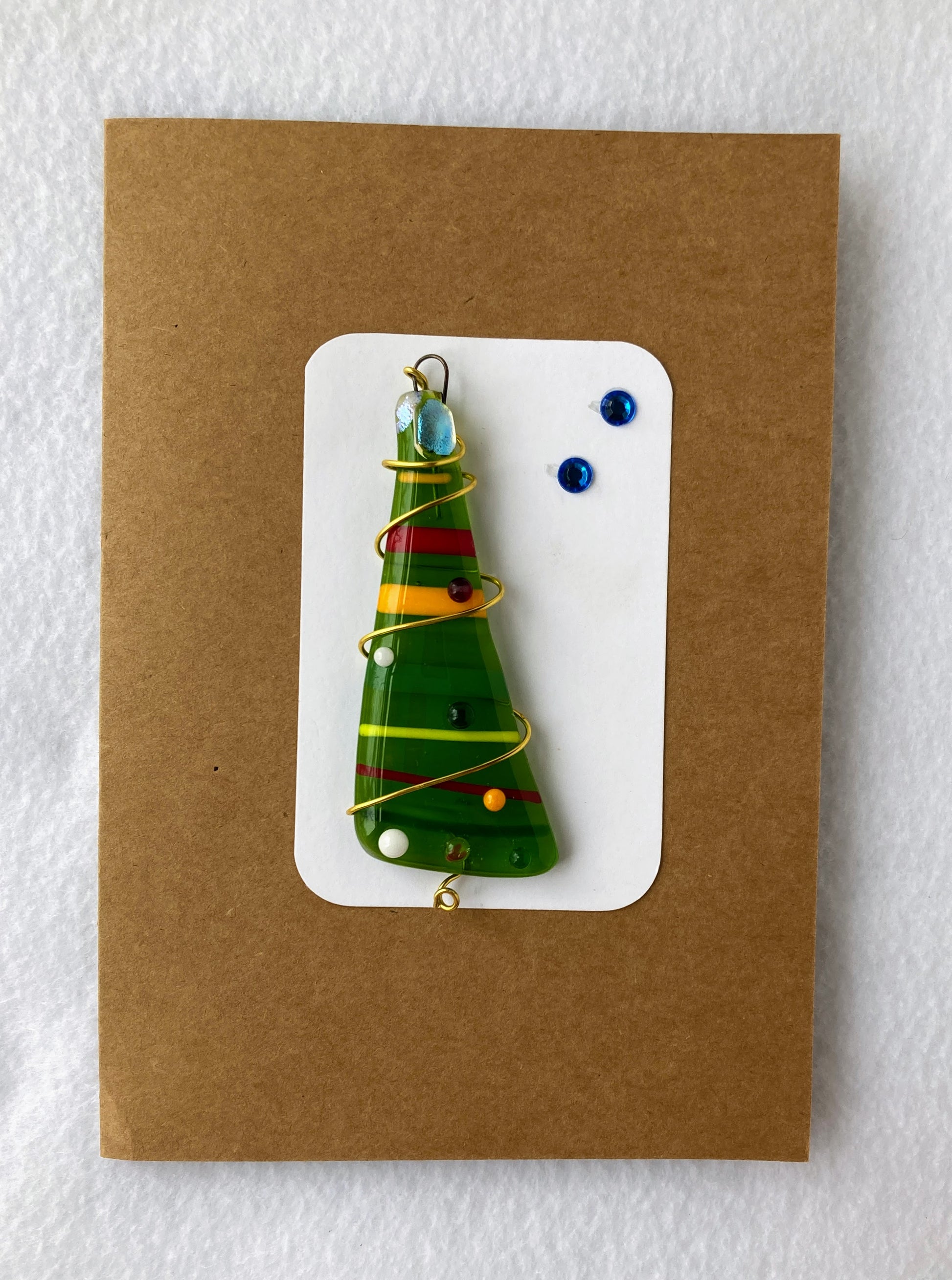 Fused Glass Ornament and card  Light green Christmas Tree with red, green and yellow stripes  Red wire wrapping gives the looks of festive tinsel   Small glass dot ornaments  Copper wire wraps around tree
