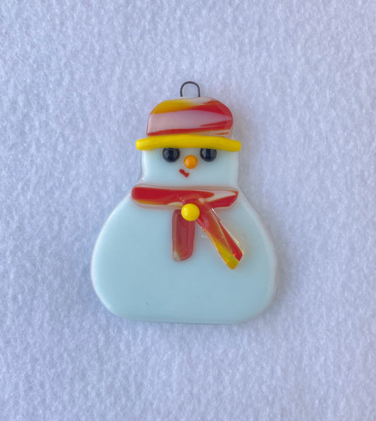  Snowman wearing a red yellow and white hat with yellow trim  Scarf is red yellow and white with a yellow glass dot button  Fused Glass Ornament