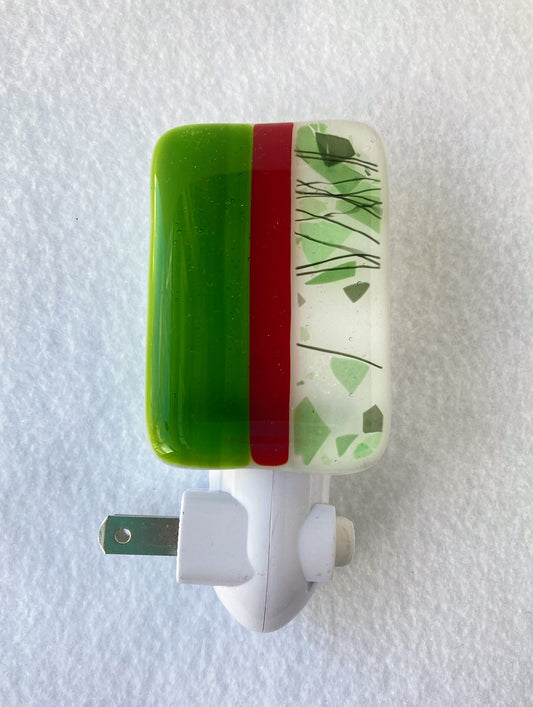 Fused Glass Nightlight  Green, Red and White stripe  White stripe has  decorative green flecks and stripes  2 1/2" long x 2 1/2" high x 1/4" wide fused glass  Total height of glass and nightlight is 4"  2 prong plug 