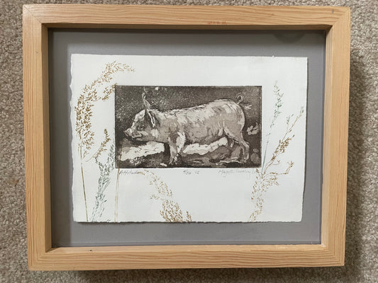 framed mixed media intaglio print of a little pig