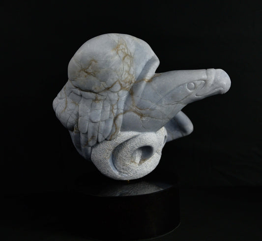 " Course Correction " Blue Ice Alabaster Sculpture Sculpture Artist: Jerry Wood  Carved from Italian Blue Ice Alabaster  Won best of show for VA creators festival  Won 2nd place at national VA sculpture festival  Won 2nd place at Platte Valley Festival of arts in Saratoga in 2023