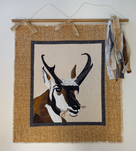 Quilted wall hanging of a Pronghorn