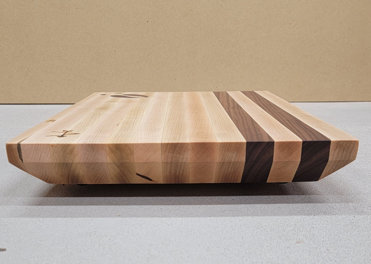 " Moose " Maple and Walnut &nbsp;Wood Cutting Board

Artist: Kevin Shimkus

Edge-grain cutting board made of walnut and maple
Large, very sturdy cutting board that will last for generations to come.

Moose footprint inlay in lower left corner

Two walnut stripes at the top of board

Has four small feet on bottom side of cutting board to prevent slipping

12" wide by 18" long by 2" deep

8.5 lbs
