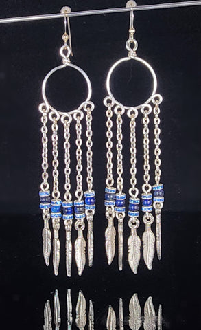 Blue tiger's eye and blue crystal beads on silver colored artistic wire  Sterling Silver ear wires  3.5" long x  1" wide  Long dangling earrings