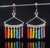 Rainbow of Swarovski crystal beads on silver colored artistic wire  Sterling Silver ear wires  1.8" long x  1.4" wide  Long dangling earrings