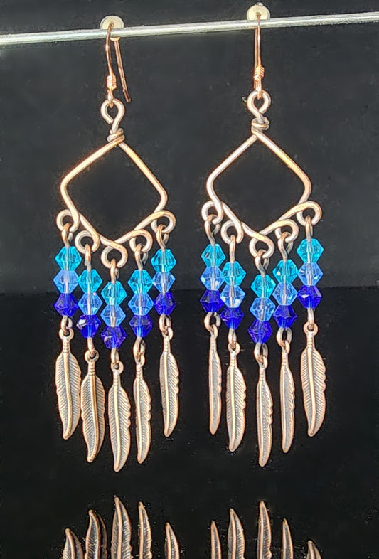 Blue Swarovski crystal beads on oxidized copper  Sterling Silver ear wires  2.72" long x  .93" wide  Long dangling earrings