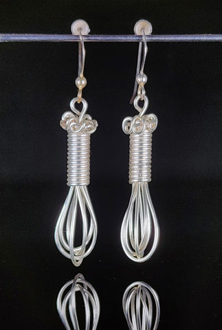 Silver colored artistic wire in the shape of a whisk  Stirling silver ear wires  1.6" long x  .93" wide  Perfect for anyone who enjoys cooking