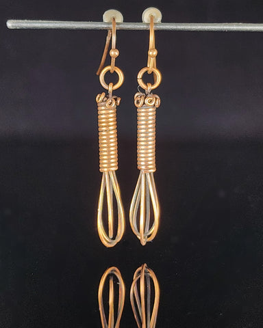 Oxidized copper wire in the shape of a whisk  Copper ear wires  1.31" long x  .29" wide  Perfect for anyone who enjoys cooking