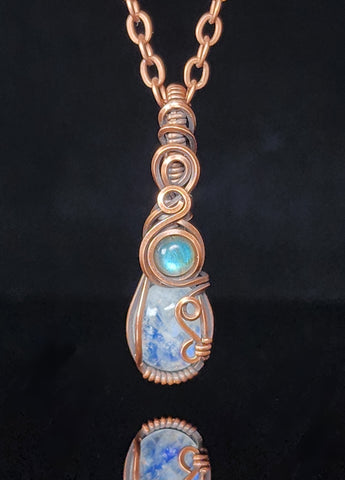Moonstone and Labradorite in oxidized copper  1.44" Long x .4" Wide  Copper chain with lobster clasp closure  A beautiful delicate necklace for everyday use  Care instructions with polishing cloth included