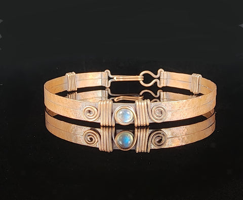 Hammered Oxidized Copper Bracelet  6mm Labradorite stone attached with woven copper wire  Hook and loop copper clasp  7.5" wrist size  1/4" wide  Care instructions and cleaning cloth provided