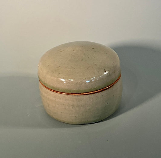 Hand thrown round box with lid  Chun glaze on inside and outside  5' wide 5' long 3' tall