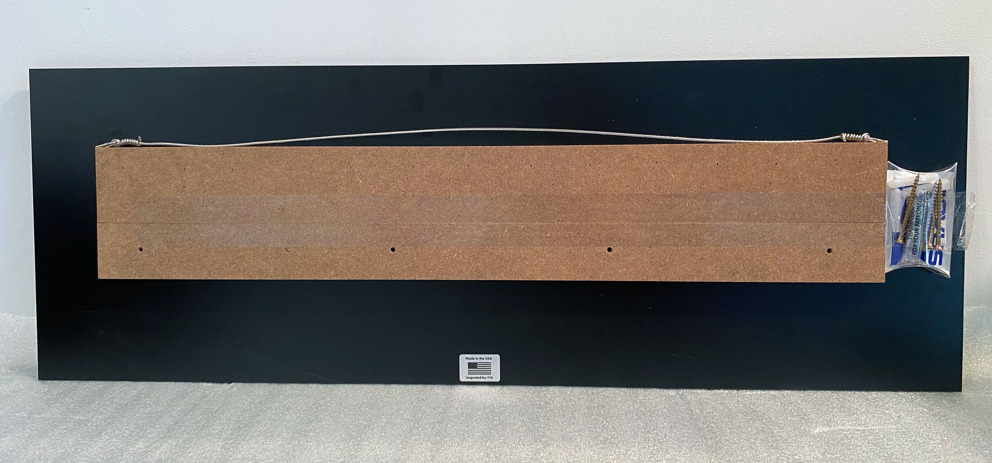 backside view of a FloatPlaq photo
