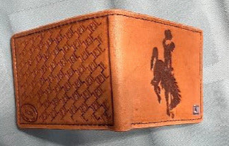 Men's bifold wallet with University of Wyoming " Steamboat " logo. Basket stamp on the back. 6 card slot, one bill pocket, 1 hidden pocket