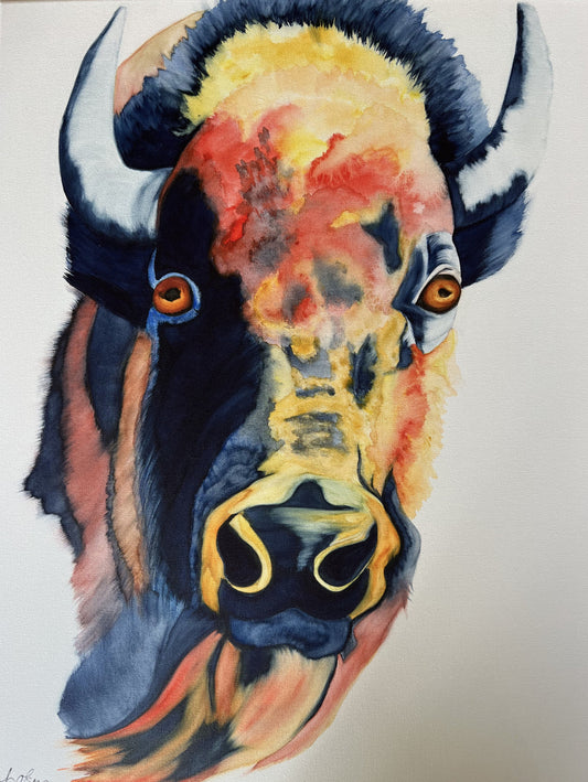 from a watercolor painting of a buffalo head. Bright colors of orange, yellow, red and black