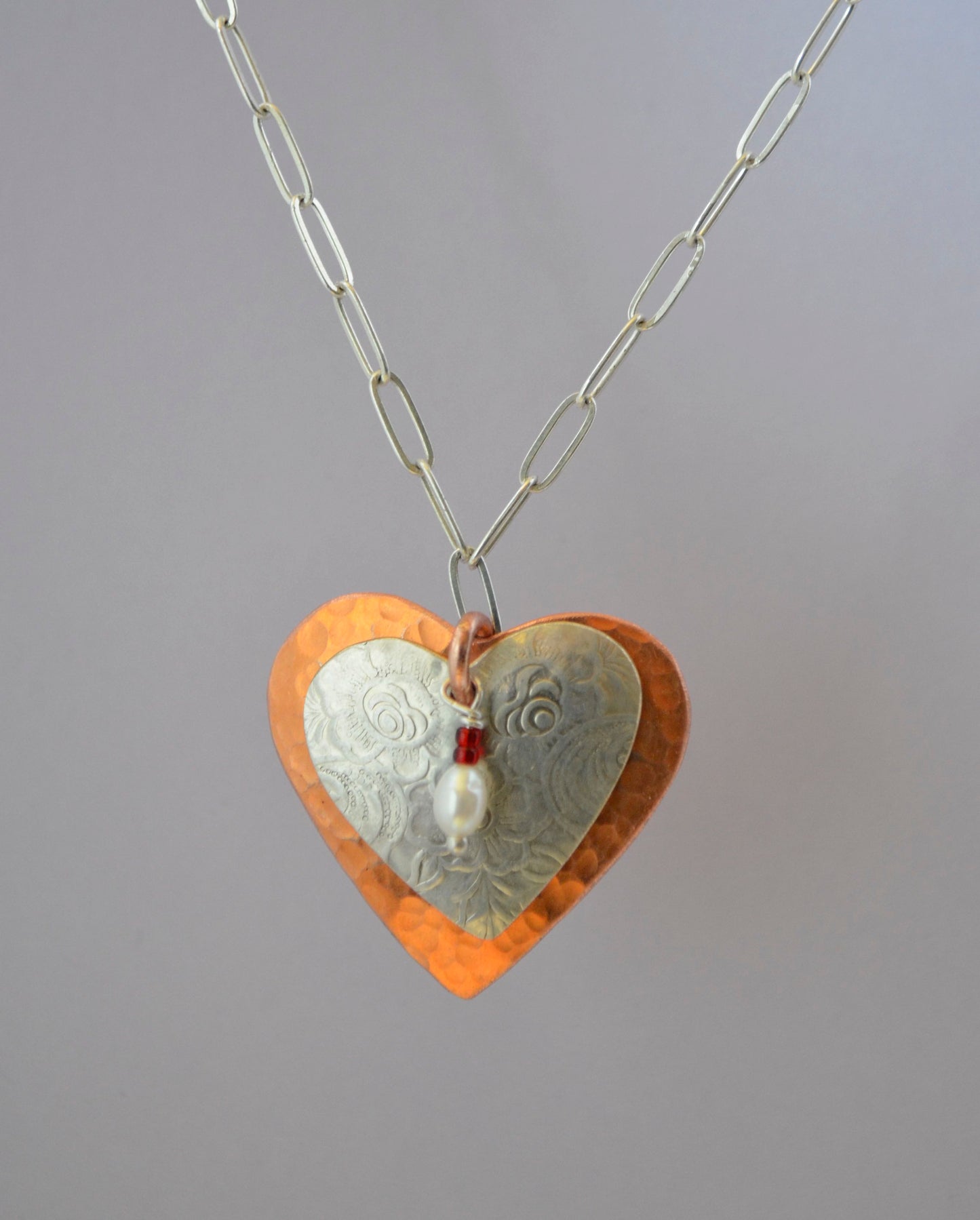 Double Heart Necklace Hearts of Embossed Silver Plate Floral & Hammered Copper with Seed Pearl & Ruby Glass Beads