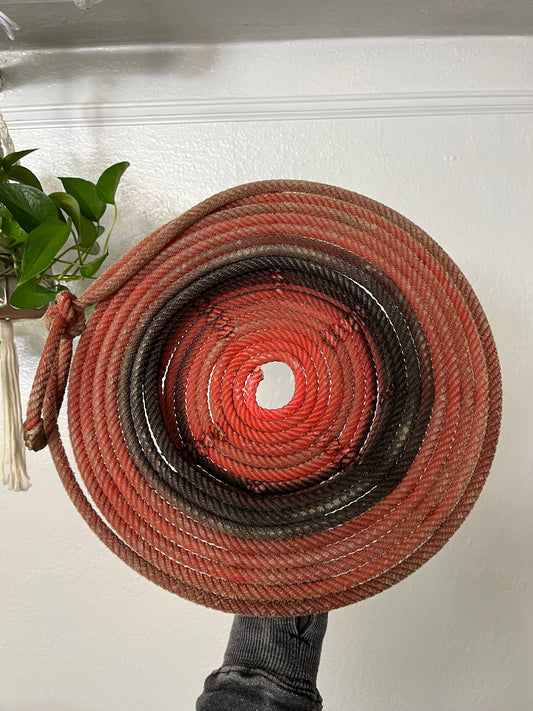 Red Brimmed Rope Basket Artist: Aleah Russell  Repurposed lariat rope  Rope came from an authentic Wyoming ranch  Shallow rope basket with wide brim  Will add a touch of country to any home  Would make a nice fruit basket  Add a bowl inside for holding small items  14.5" long x 13.5" high x 3" wide