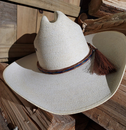 hand braided horsehair hatband on a straw cowboy hat. 