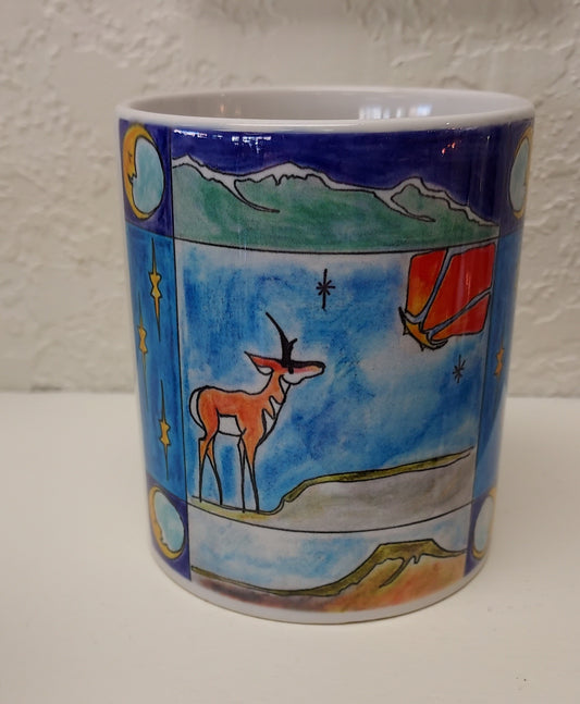 " Lope Shooting Star " Mug Artist: Celeste Havener 8 oz white ceramic mug with handle  Print of the original drawing " Lope Shooting Star " is on the mug  Pronghorn antelope looking at the Star  " Lope Shooting Star " is an original drawing by the artist  Great for a cup of coffee or tea