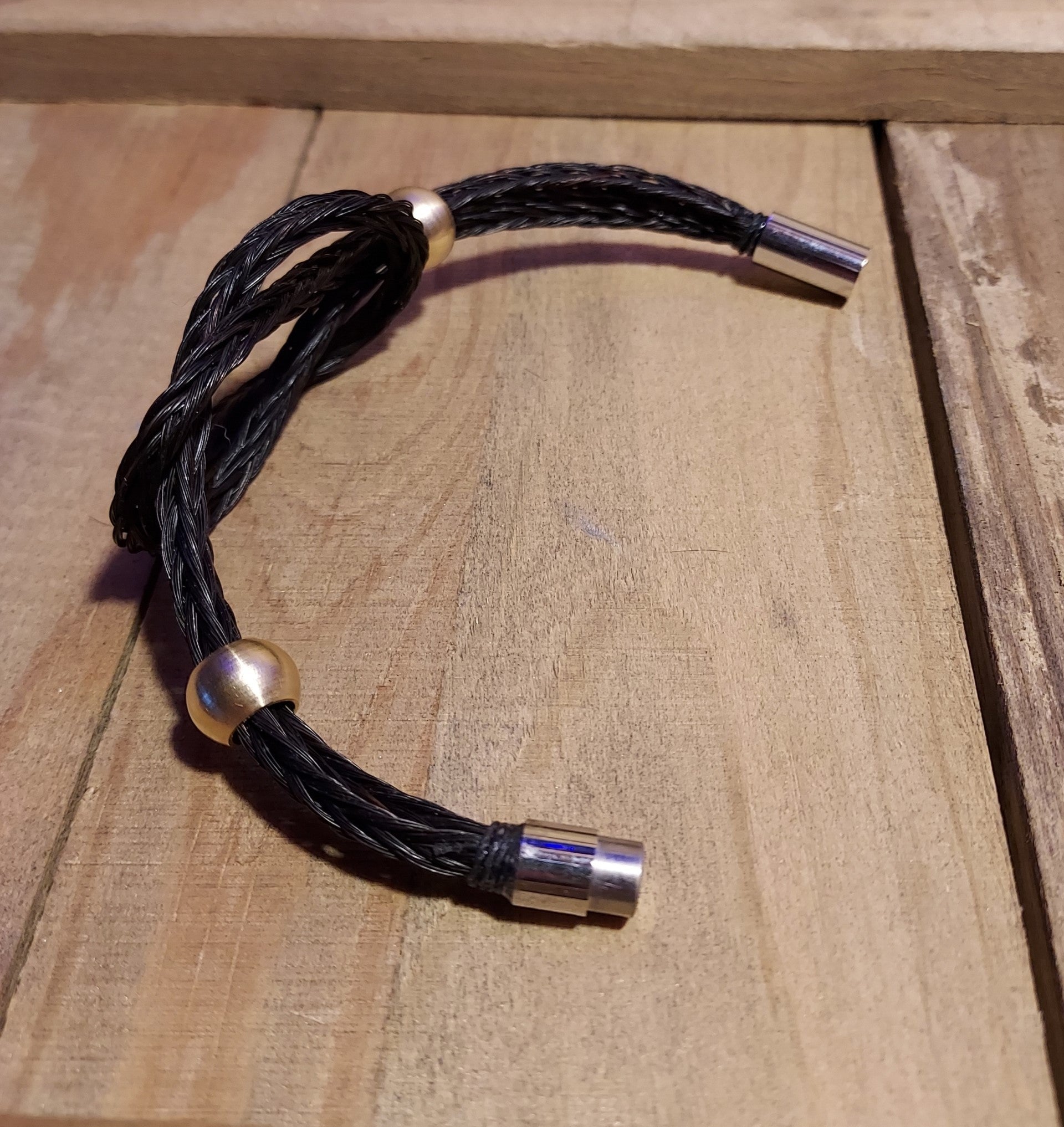 magnetic clasps used to secure the braided black horsehair bracelet